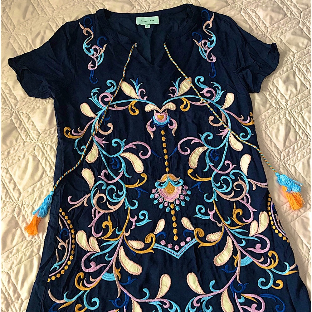 Navy blue mini dress by ‘Skies are Blue with colored embroidery/tassels.Size S